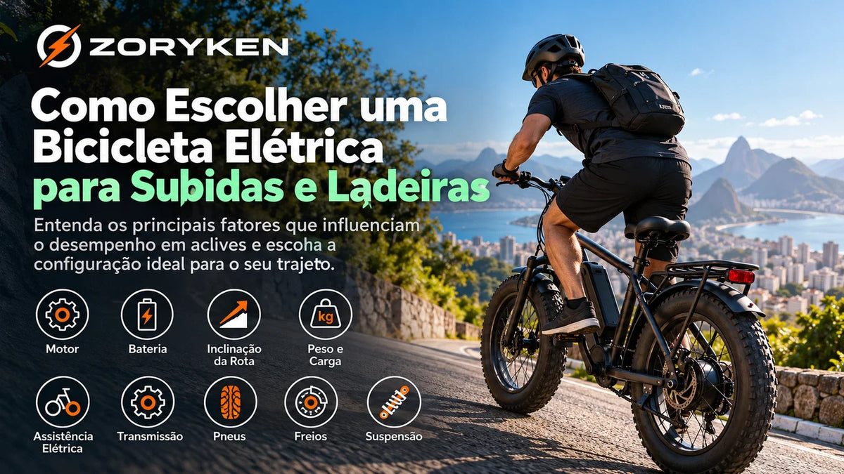 Ciclista em bicicleta elétrica subindo uma ladeira, com destaque para motor, bateria, inclinação da rota, peso, pneus, freios e suspensão.