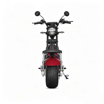 Visão frontal da scooter elétrica ZORYKEN M8-2000 em vermelho metálico, destacando o pneu largo, farol redondo de LED e guidão com retrovisores.